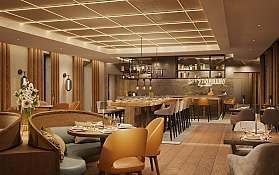 Zartes Lammkarree auf einem Holzbrett, perfekt zubereitet.